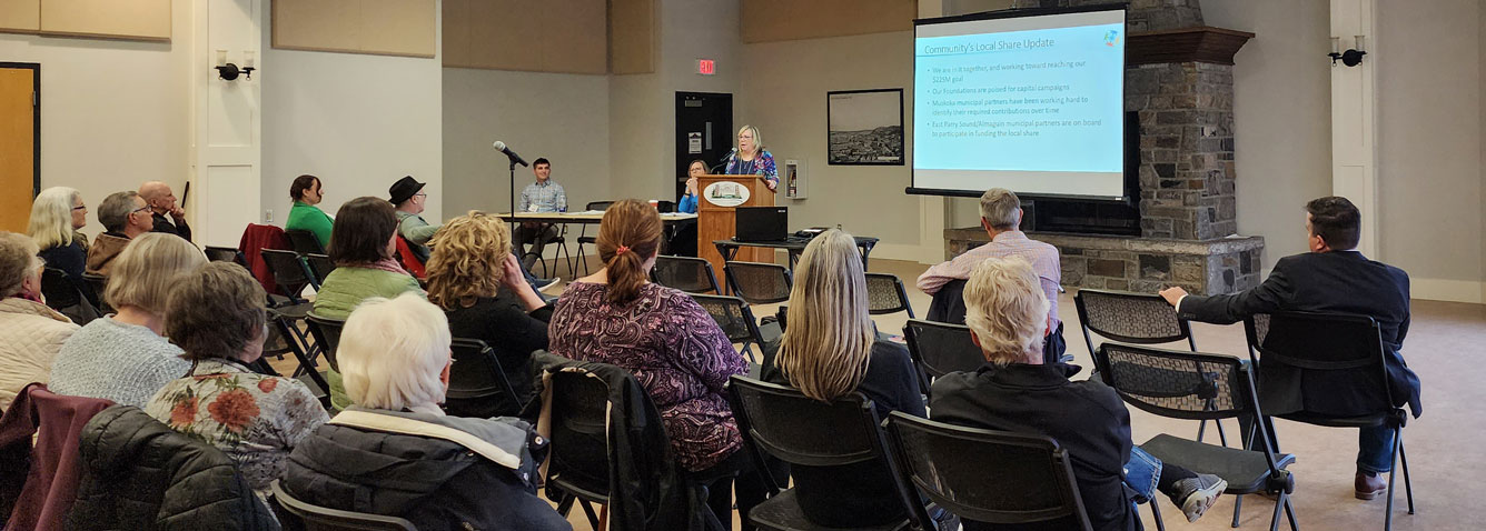 President & CEO Cheryl Harrison speaks at a community information session.