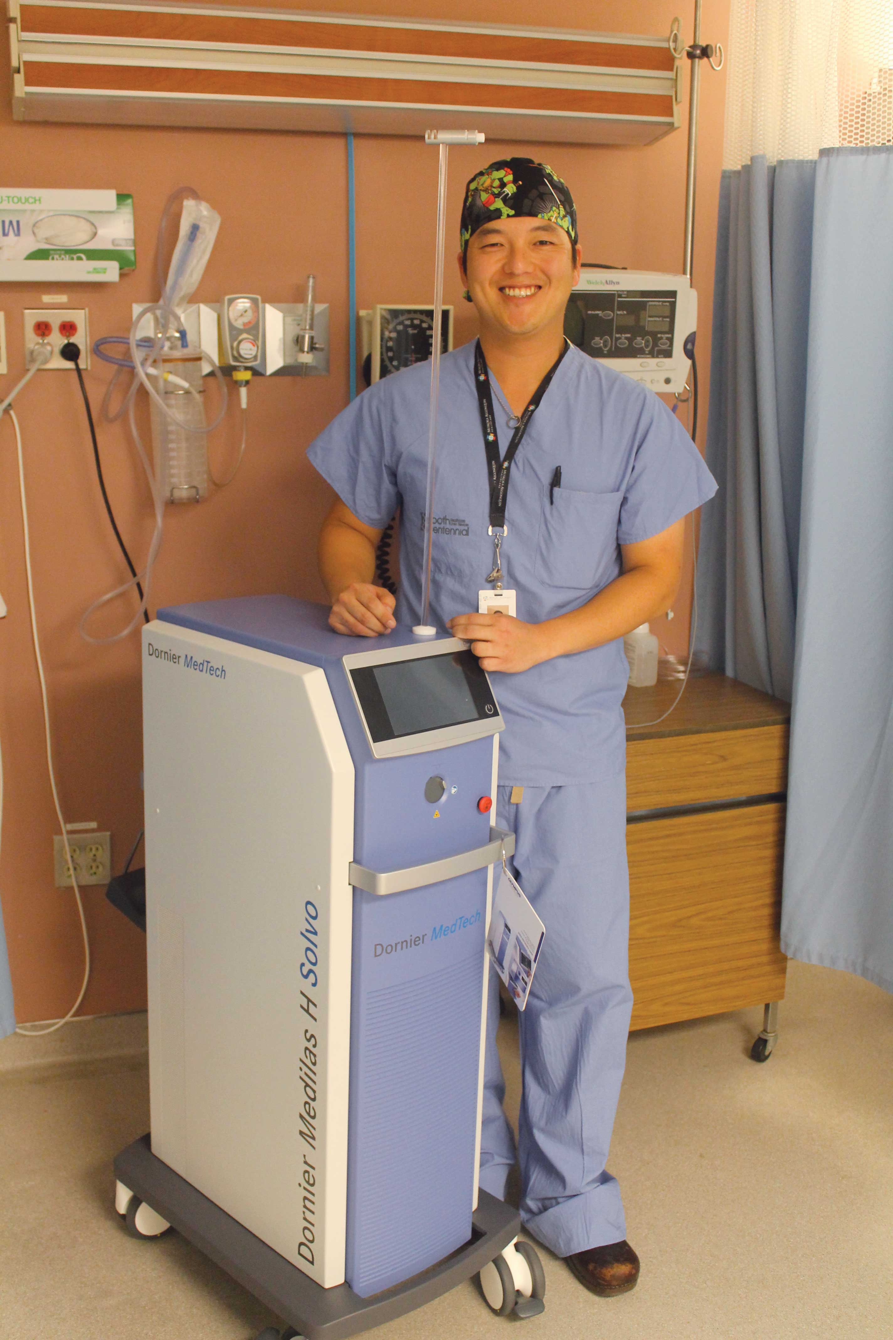 Dr. Jonathan Rhee with the new holmium laser purchased by the South Muskoka Hospital Foundation.