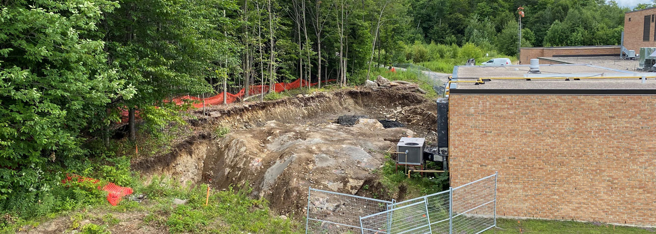 Construction site showing exposed bedrock where an expansion of the Huntsville Hospital is occurfing.