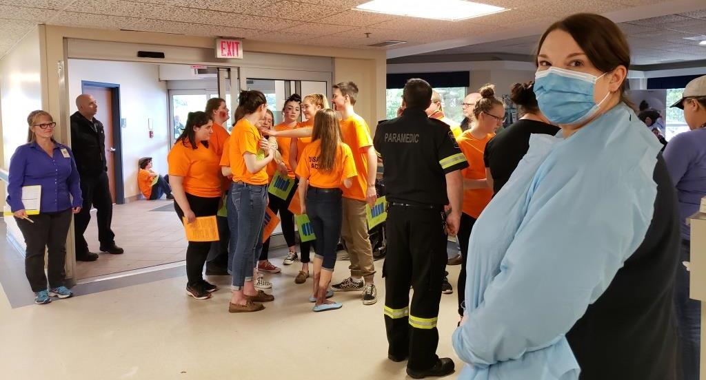 Staff prepare for influx of mock disaster victims arriving at hospital